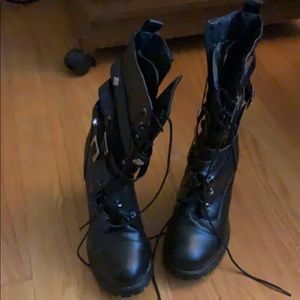 Black heeled combat boots. Never worn.